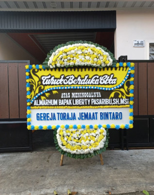 Papan Bunga Duka di Joglo